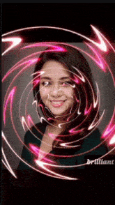 a woman is surrounded by a swirl of pink lights