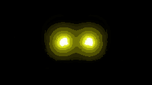 a glowing yellow object is against a black background and says ' aerie ' on it