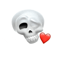 a skull with a red heart in its mouth is making a wink .