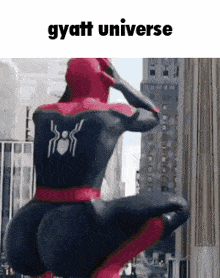a man in a spiderman costume is squatting down in front of a building with the caption gyatt universe