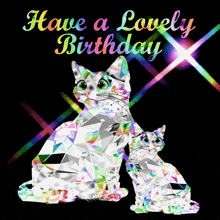 a greeting card with two cats and the words have a lovely birthday