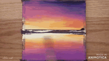 a painting of a sunset by chloe art
