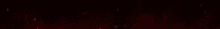 a red light is shining on a black background