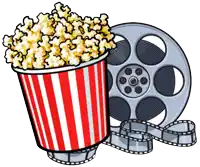 a striped bucket of popcorn sits next to a roll of film