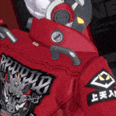 a red jacket with a patch that says warrior