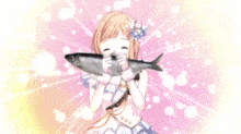 a girl is holding a large fish in front of her .