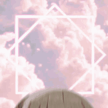 a close up of a person 's head with a pink triangle in the sky