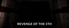 a poster for revenge of the 5th shows darth vader holding a red light saber