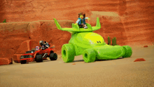a toy story character is sitting on top of a green car