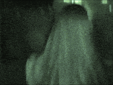 a black and white photo of a person 's face