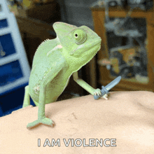 a chameleon holding a toy sword with the words " i am violence " above it