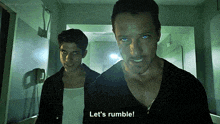 two men standing next to each other with one saying let 's rumble !