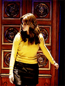 Jenna Coleman Yellow Jumper GIF - Jenna Coleman Yellow Jumper Leather Skirt GIFs