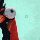 a close up of a cartoon bird 's eyes with the letter h in the background
