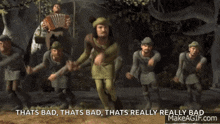 a group of men are standing next to each other in a forest and talking .