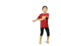 a little girl wearing a red shirt with a dragon on it is dancing