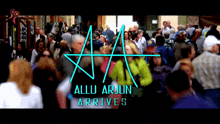 a blurred image of a crowd with the words " allu arjun arrives "
