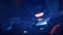 a robot with glowing red eyes is standing in the dark .