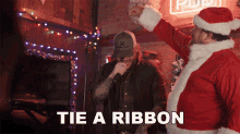 Tie A Ribbon Around Yourself Jon Langston GIF - Tie A Ribbon Around Yourself Jon Langston I Only Want You For Christmas Song GIFs