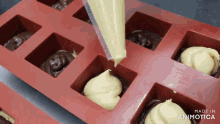 a video of a person pouring batter into a silicone tray is made in animatica