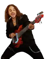 a man with long hair playing a red bass guitar