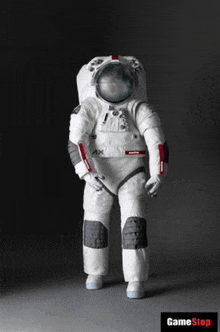 an advertisement for gamestop shows an astronaut in a white suit