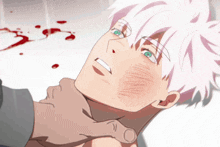 a man with white hair and green eyes is being held by someone