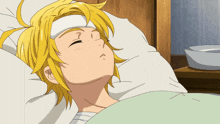 a person is laying in a bed with a thermometer in their mouth