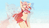 a girl in a pink bikini is holding a flower