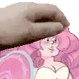 a cartoon character with pink hair and a heart shaped chest is sitting in a chair with a donut on her head .
