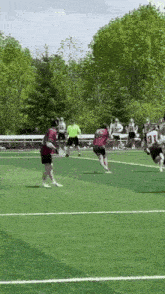 a lacrosse player with the number 31 on his jersey runs on the field