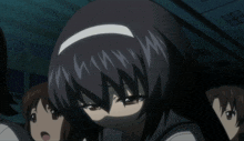 a girl with black hair and a white headband