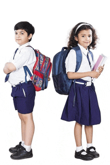 a boy and a girl are standing next to each other with backpacks