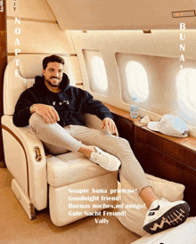 a man sits in a chair on an airplane with the words noapte buna pristene goodnight friend written on the bottom