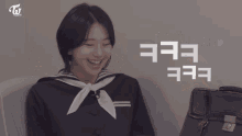three girls are sitting at a table with twice written on the top left