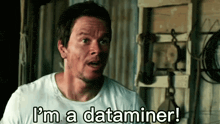 a man in a white shirt says " i 'm a dataminer ! "
