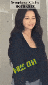 a woman is standing in front of a sign that says " symphony club 's hot babes "