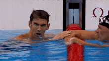 High Five Michael Phelps GIF - High Five Michael Phelps Ryan Lochte GIFs
