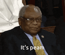a man in a suit and tie with the words it 's peam below him