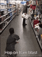 a boy is kneeling down in a store with the words hop on flam blast