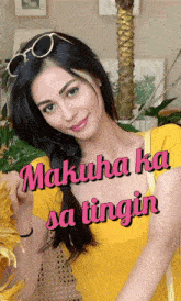 a woman in a yellow shirt with the words makuha ka sa tingin