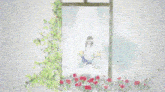 a woman is sitting on a swing in front of a window with flowers in the background .