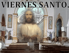 a picture of jesus in a church with the words viernes santo on the bottom