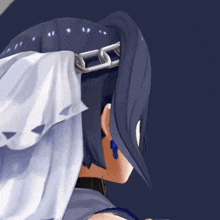 a close up of a person 's ponytail with a chain around it