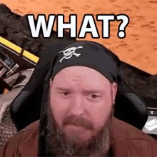 a man with a beard is wearing a pirate hat and says what ?