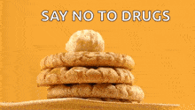a stack of cookies on a plate with the words say no to drugs