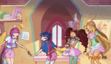 a group of girls are standing in a room with a nickelodeon ad on the bottom right