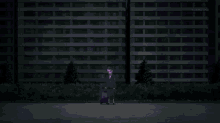a person is standing in a dark room surrounded by purple smoke .
