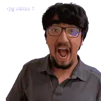 a man with glasses and a beard has his mouth open