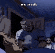 a person is reading a book with a circle in the background and the words read the trello on the bottom .
